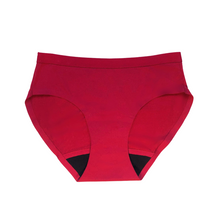 Load image into Gallery viewer, Red seamless period underwear is shown in this image. The color is a vibrant red with hints of pink. The gusset (small absorbent area in the crotch) is black, whereas the rest of the underwear is red. There is a modest waistband that won&#39;t dig in to the skin, but will hold the underwear up. These are Heralogie branded period undies.
